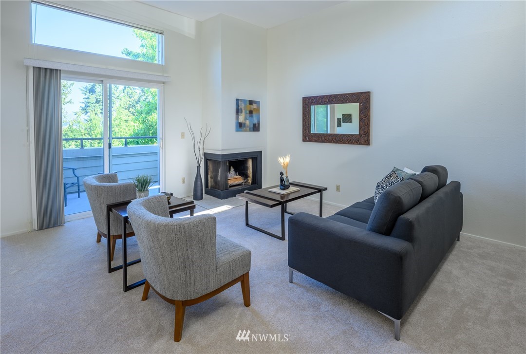 7335 Old Redmond Road, Unit 125 Redmond, WA 98052 - Photo 3 of 15 a living room with furniture and a fireplace