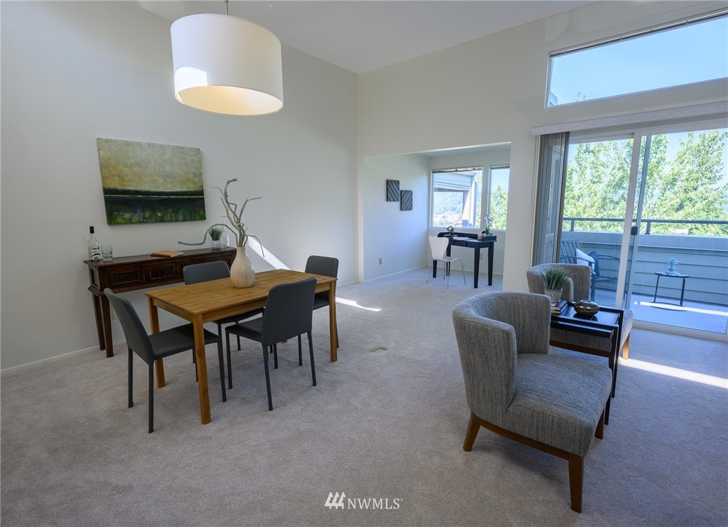 7335 Old Redmond Road, Unit 125 Redmond, WA 98052 - Photo 4 of 15 a dining room with furniture and window