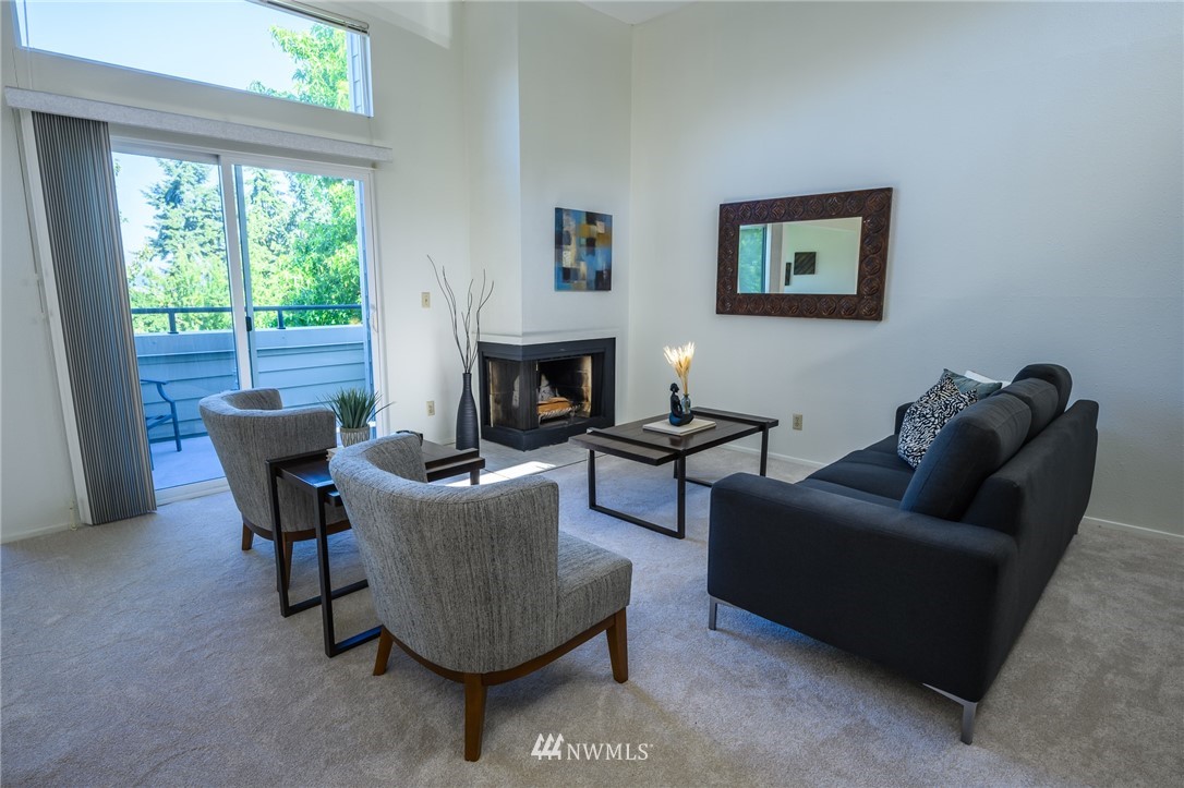 7335 Old Redmond Road, Unit 125 Redmond, WA 98052 - Photo 5 of 15 a living room with furniture and a fireplace