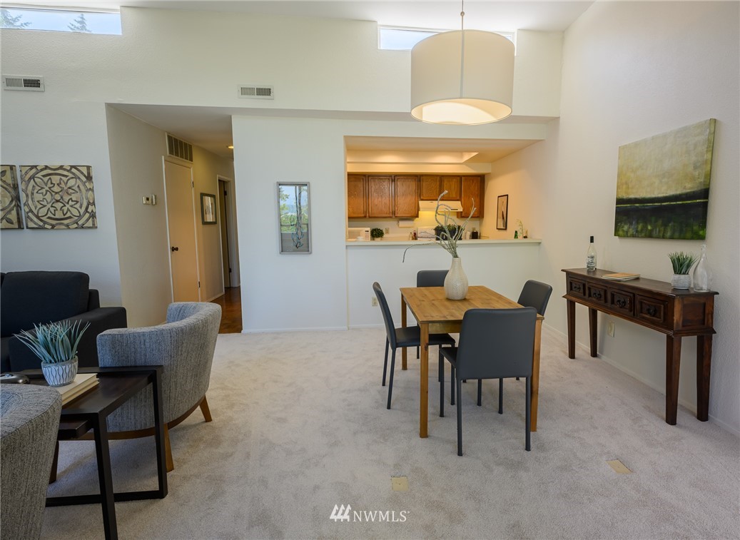 7335 Old Redmond Road, Unit 125 Redmond, WA 98052 - Photo 6 of 15 a view of a dining room with furniture