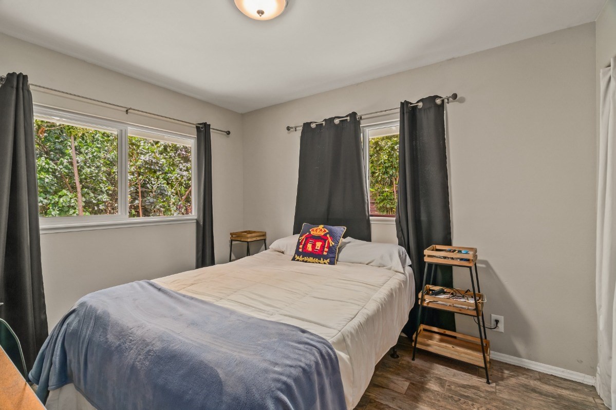 6391 Puupilo Road, Unit B Kapaa, HI 96746 - Photo 16 of 30 a bedroom with a bed and a window