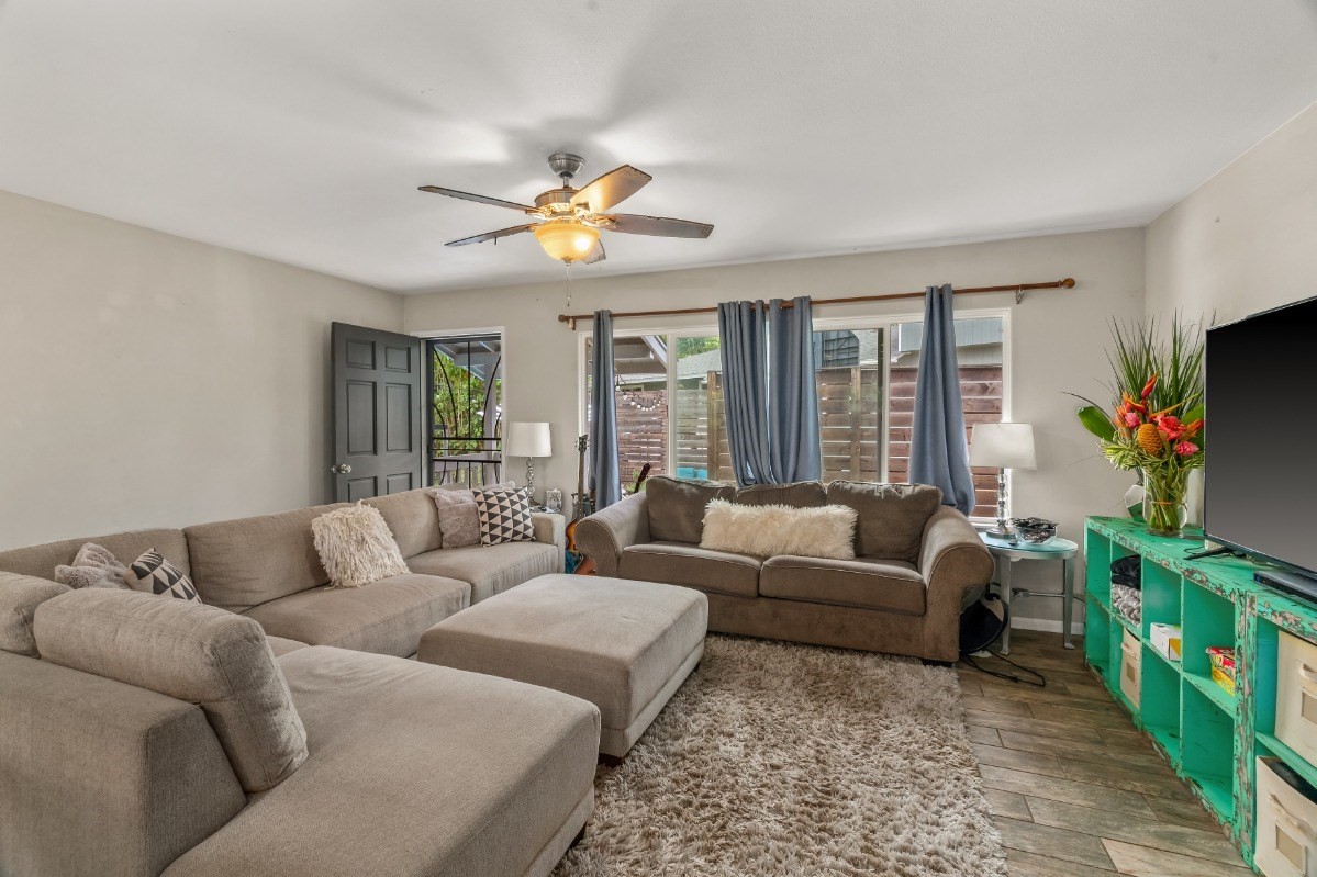 6391 Puupilo Road, Unit B Kapaa, HI 96746 - Photo 5 of 30 a living room with furniture and a flat screen tv