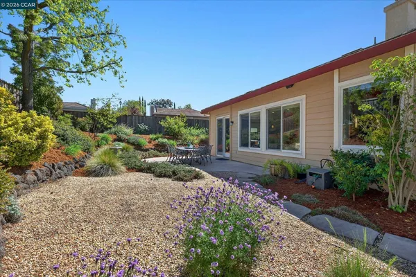 a house view with a garden space