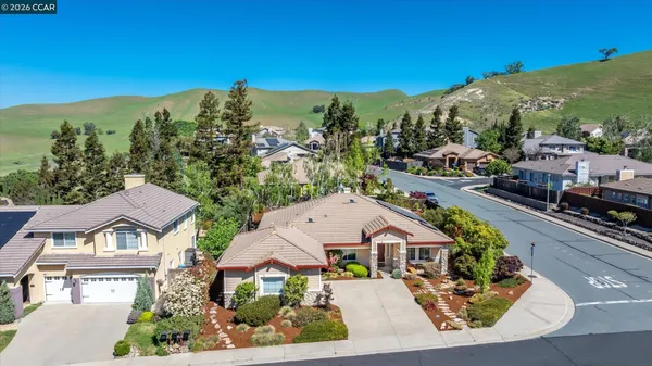 an aerial view of a house with a garden