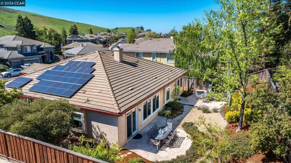 an aerial view of a house with a garden