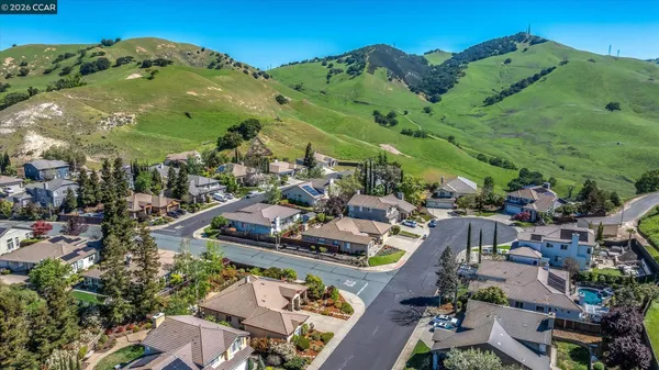 an aerial view of a house with garden