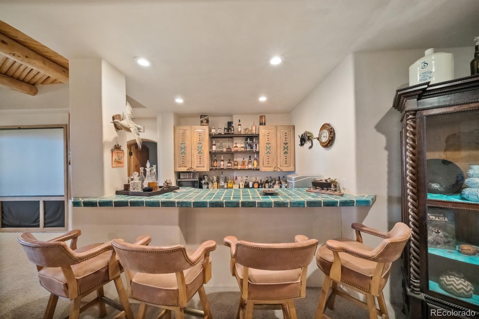 8221 Cuerna Verde Road Rye, CO 81069 - Photo 31 of 50 a dining room with furniture and a table