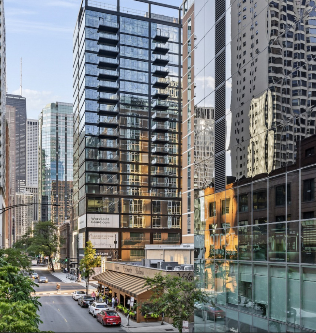 218 East Grand Avenue, Unit 1205 Chicago, IL 60611 - Photo 1 of 20 front view of a building with a street