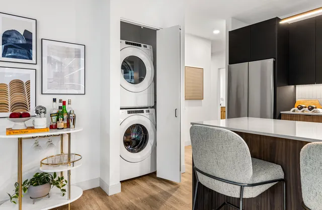 a view of swimming pool with seating area