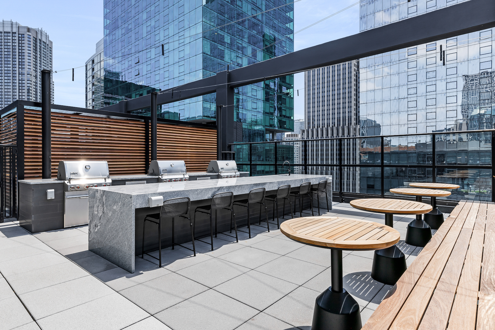 218 East Grand Avenue, Unit 1205 Chicago, IL 60611 - Photo 15 of 20 a kitchen with a sink and chairs