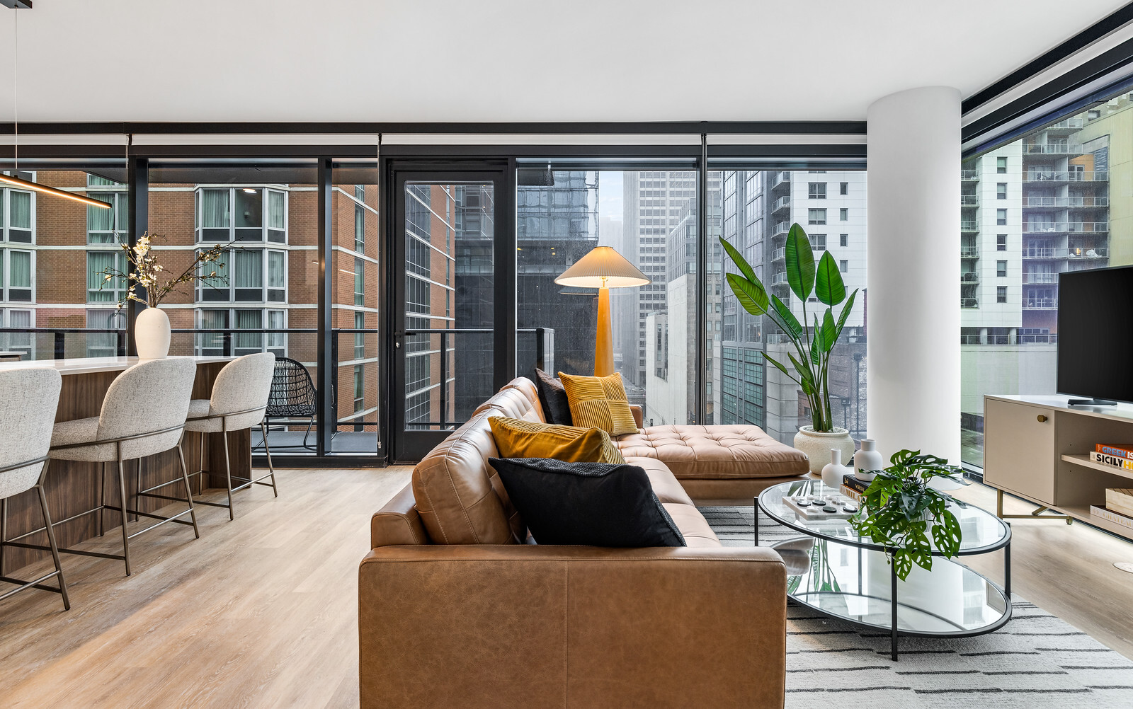 218 East Grand Avenue, Unit 1205 Chicago, IL 60611 - Photo 4 of 20 a living room with furniture and a large window
