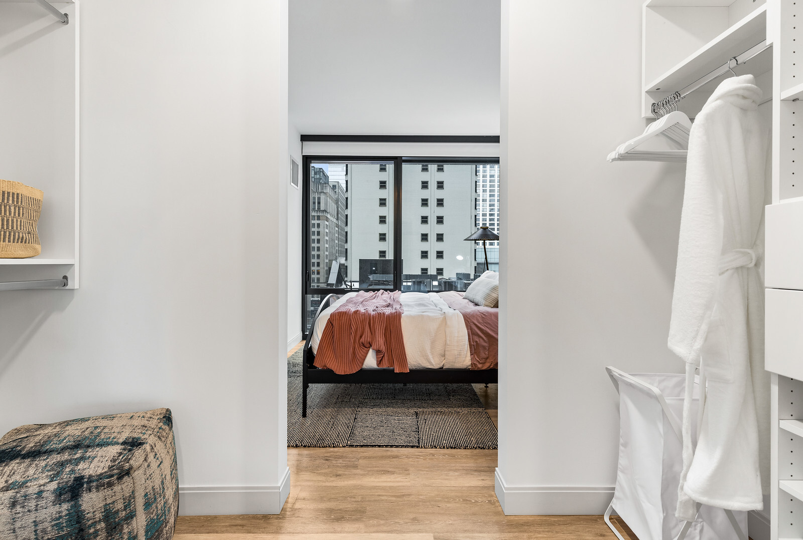 218 East Grand Avenue, Unit 1205 Chicago, IL 60611 - Photo 7 of 20 a bed room with a bed and a window