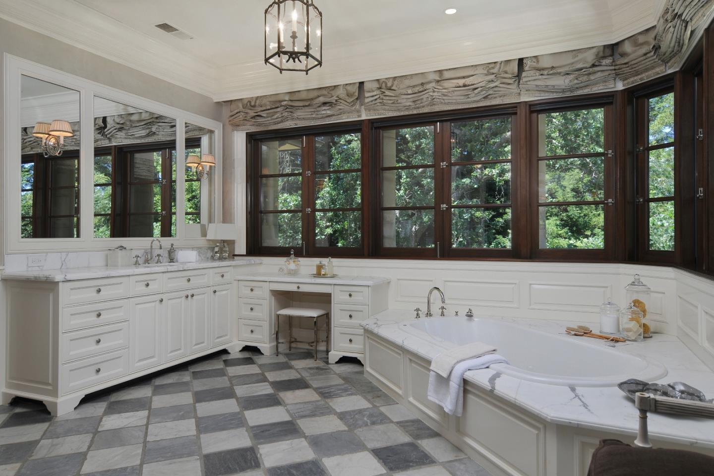 1 Faxon Road Atherton, CA 94027 - Photo 14 of 19 a spacious bathroom with a granite countertop sink mirror and window