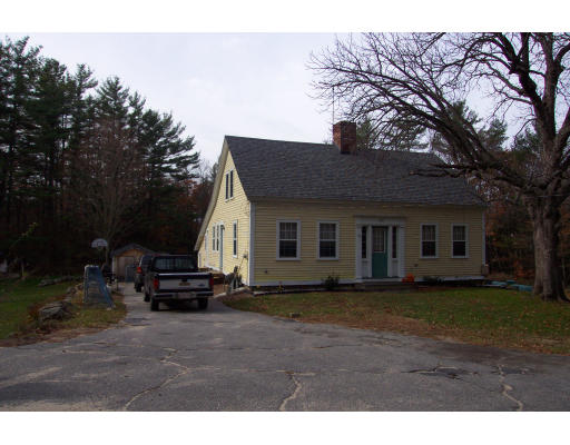a house view with a garden space