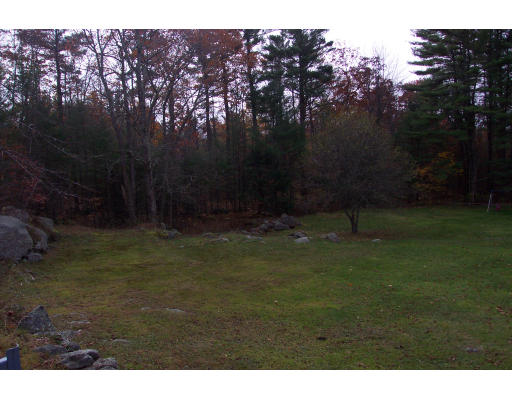 36 Healdville Road Hubbardston, MA 01452 - Photo 3 of 4 a backyard of a house with lots of green space