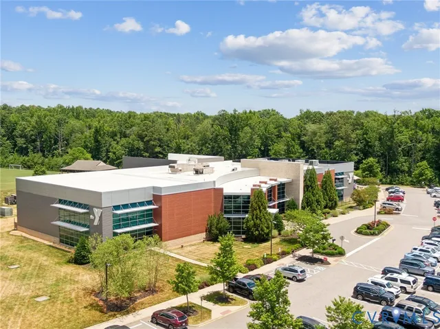 a view of a swimming pool with a lounge chairs