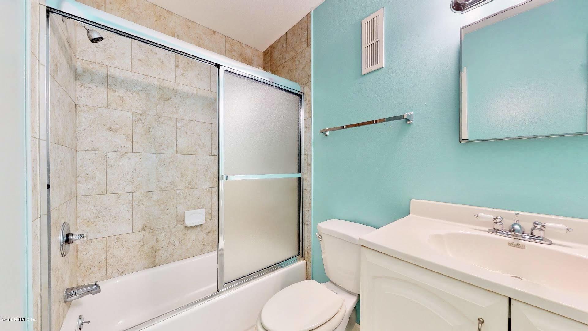 650 Pope Road, Unit 217 St. Augustine, FL 32080 - Photo 17 of 25 a bathroom with a sink and toilet
