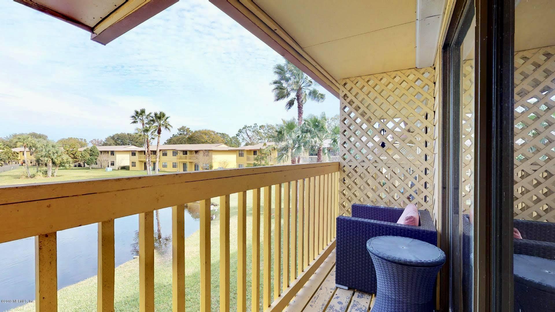650 Pope Road, Unit 217 St. Augustine, FL 32080 - Photo 18 of 25 a view of a balcony and chair
