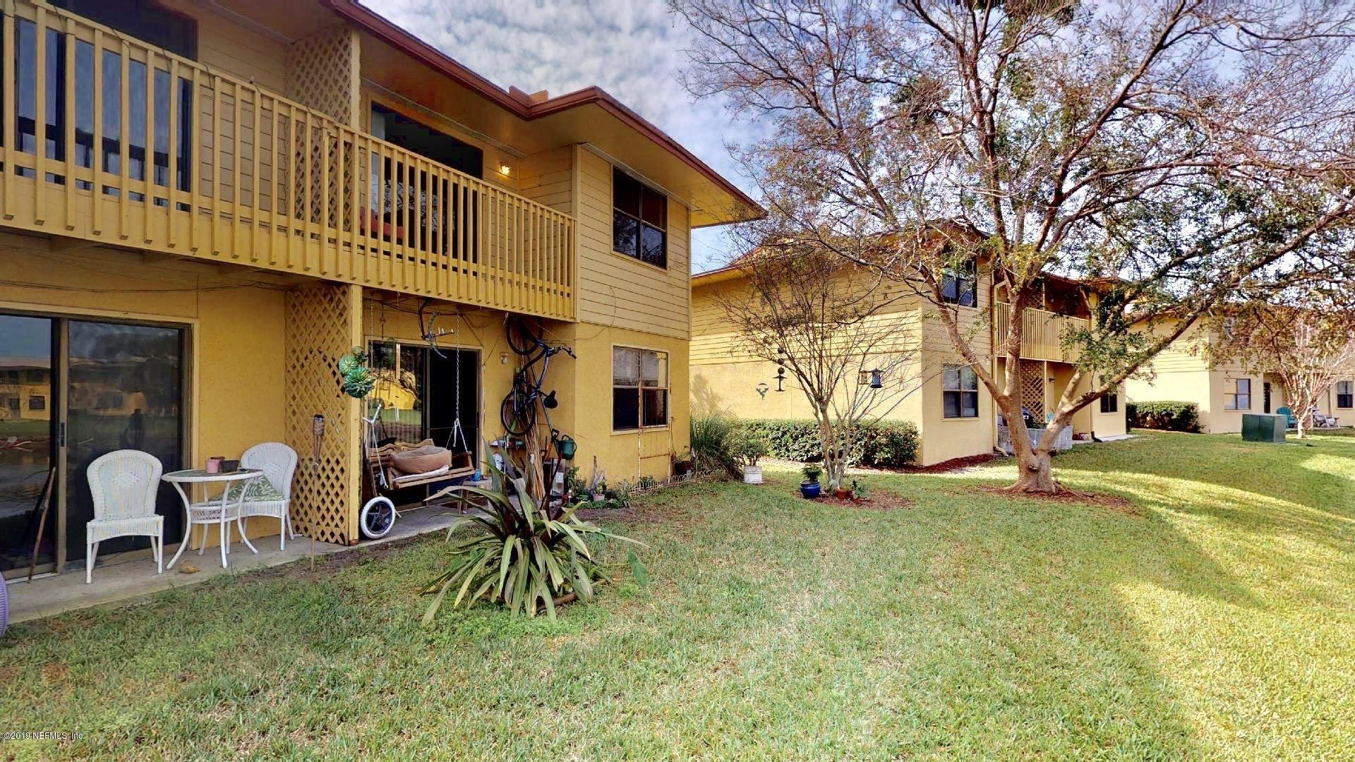 650 Pope Road, Unit 217 St. Augustine, FL 32080 - Photo 21 of 25 a view of a chairs and tables in the patio