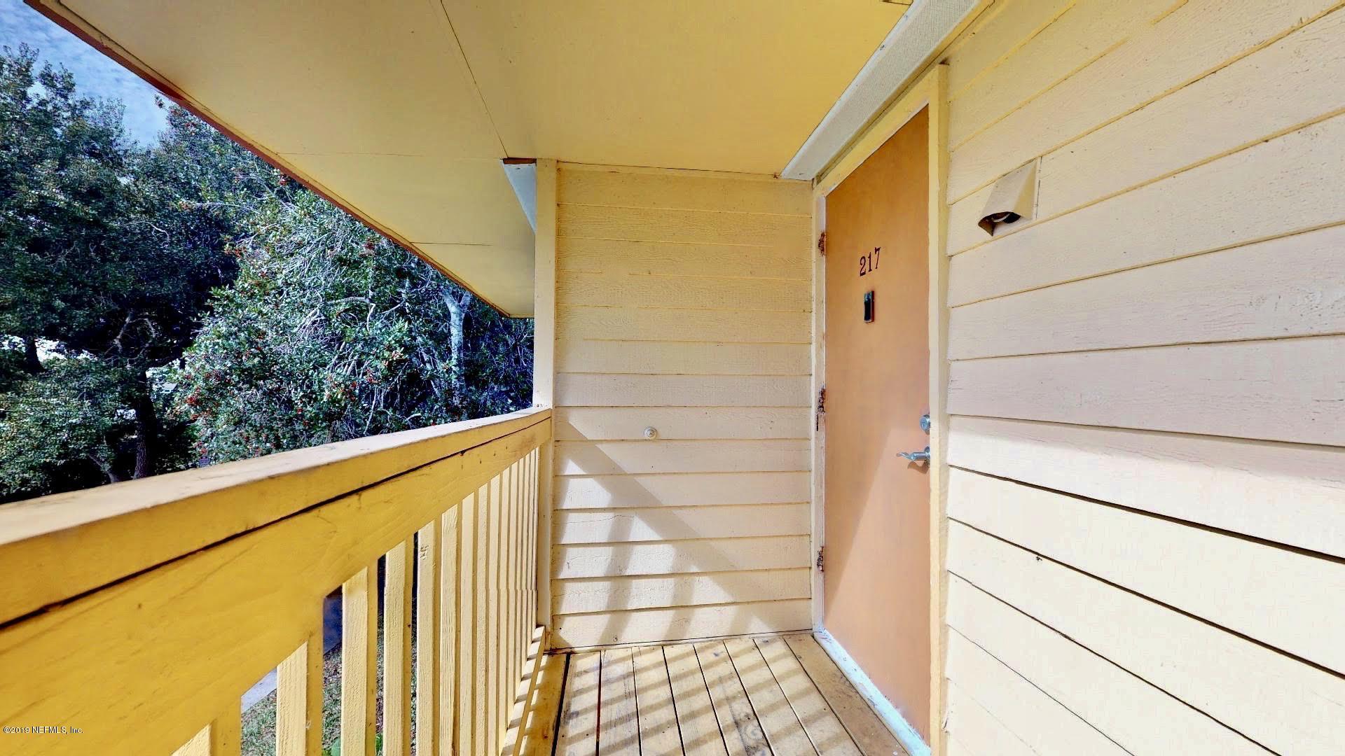 650 Pope Road, Unit 217 St. Augustine, FL 32080 - Photo 25 of 25 a view of balcony with wooden floor
