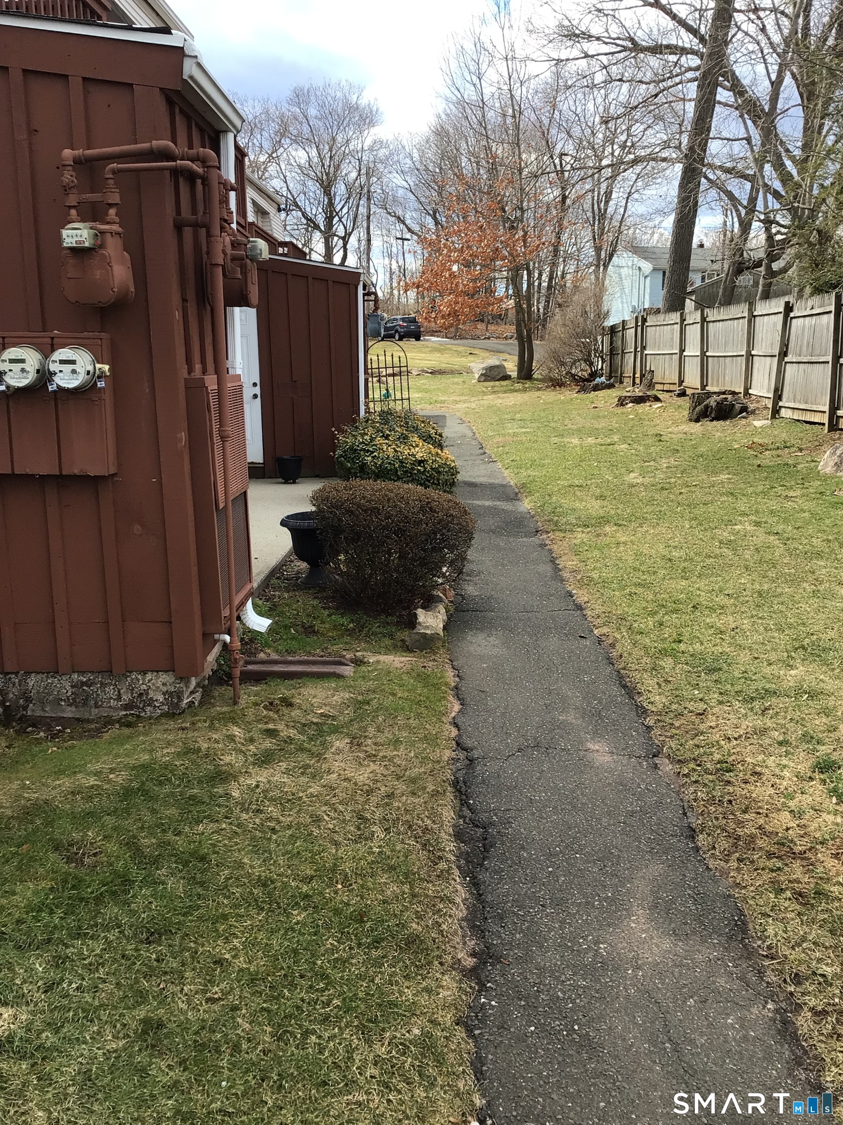 330 Short Beach Road, Unit G12 East Haven, CT 06512 - Photo 12 of 22 a view of a back yard of the house
