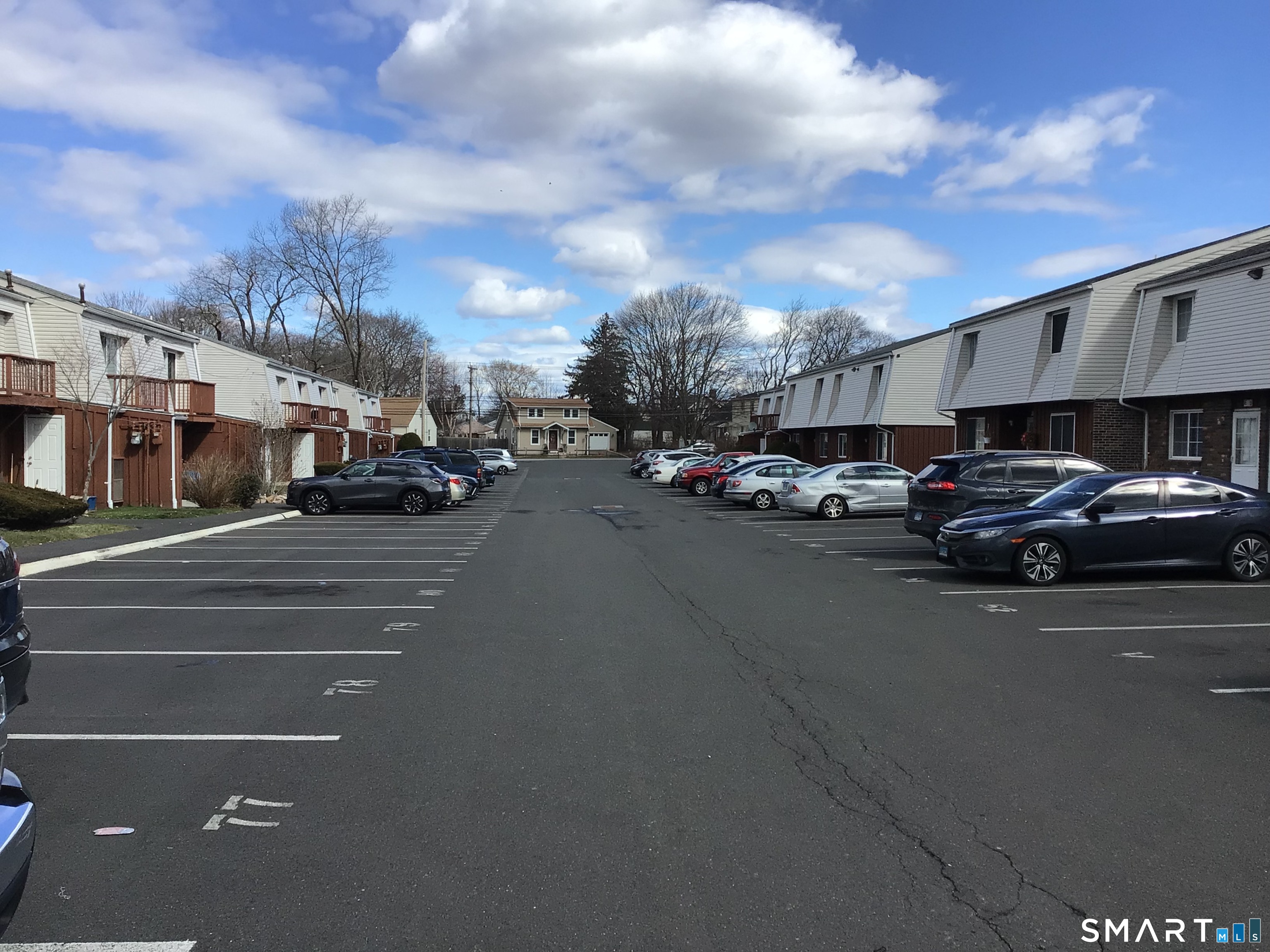 330 Short Beach Road, Unit G12 East Haven, CT 06512 - Photo 16 of 22 a view of a city street with cars