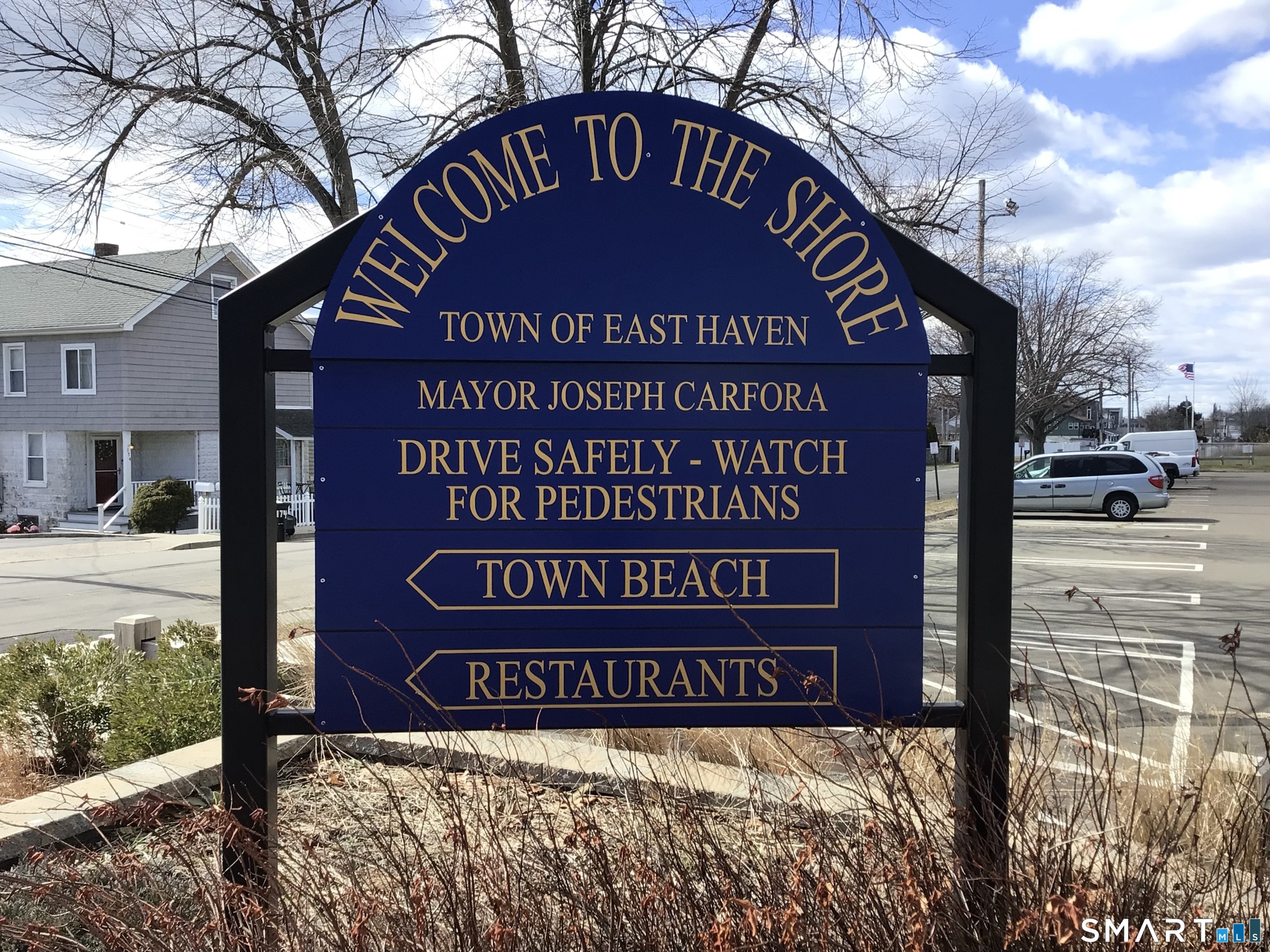 330 Short Beach Road, Unit G12 East Haven, CT 06512 - Photo 20 of 22 a sign on a pole on a street