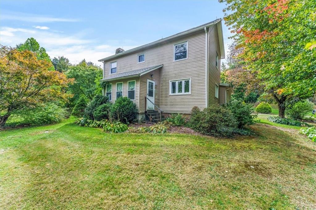 534 McCullough Road Mercer, PA 16137 - Photo 3 of 44 a house that is sitting in the grass