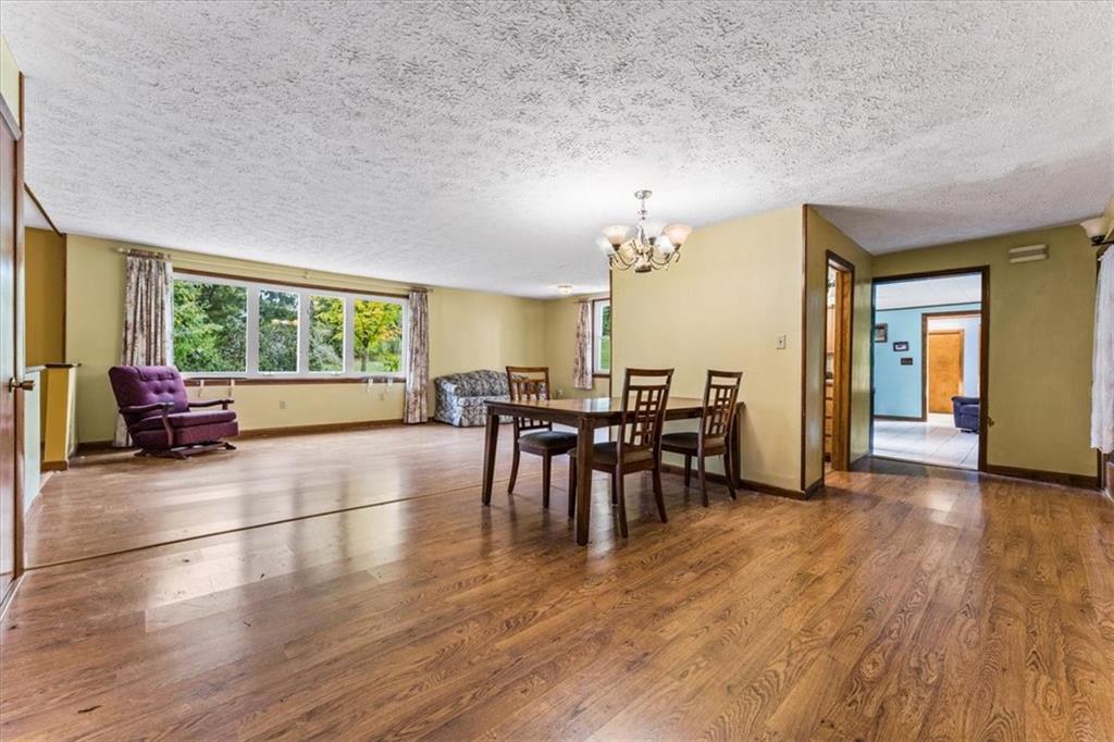 534 McCullough Road Mercer, PA 16137 - Photo 7 of 44 a view of a livingroom with furniture window and wooden floor