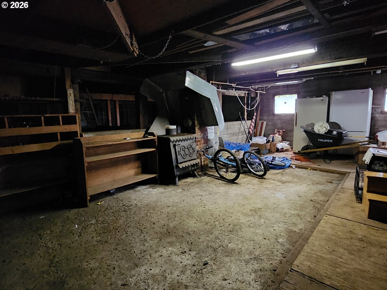45366 Highway 101 Sixes, OR 97476 - Photo 33 of 34 a view of a storage room with furniture