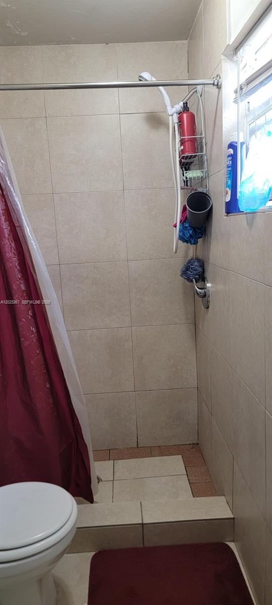 301 Southwest 36th Avenue Miami, FL 33135 - Photo 32 of 32 a bathroom with a shower and a toilet