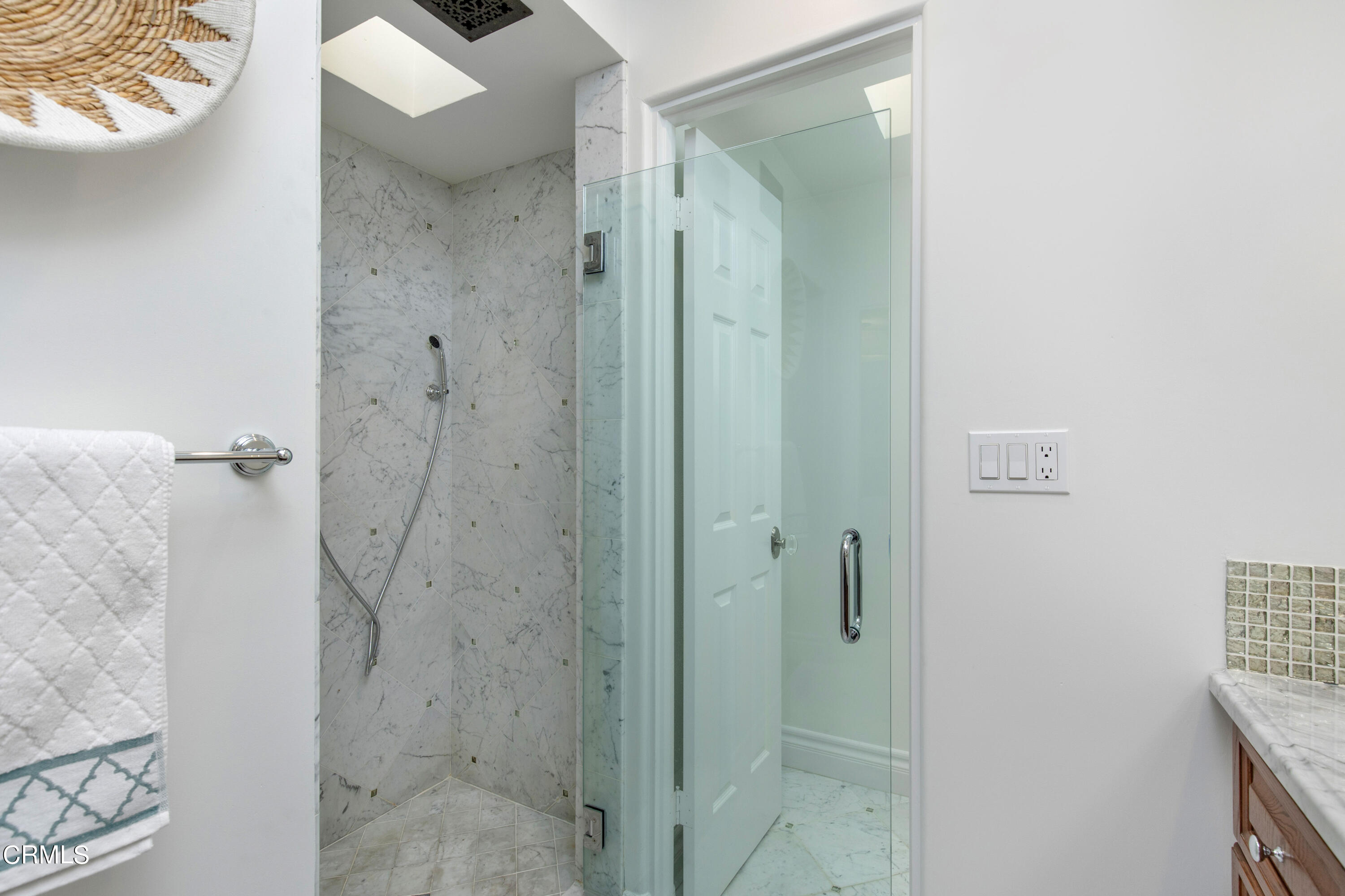 1 South Orange Grove Boulevard, Unit 12 Pasadena, CA 91105 - Photo 18 of 27 a bathroom with a shower