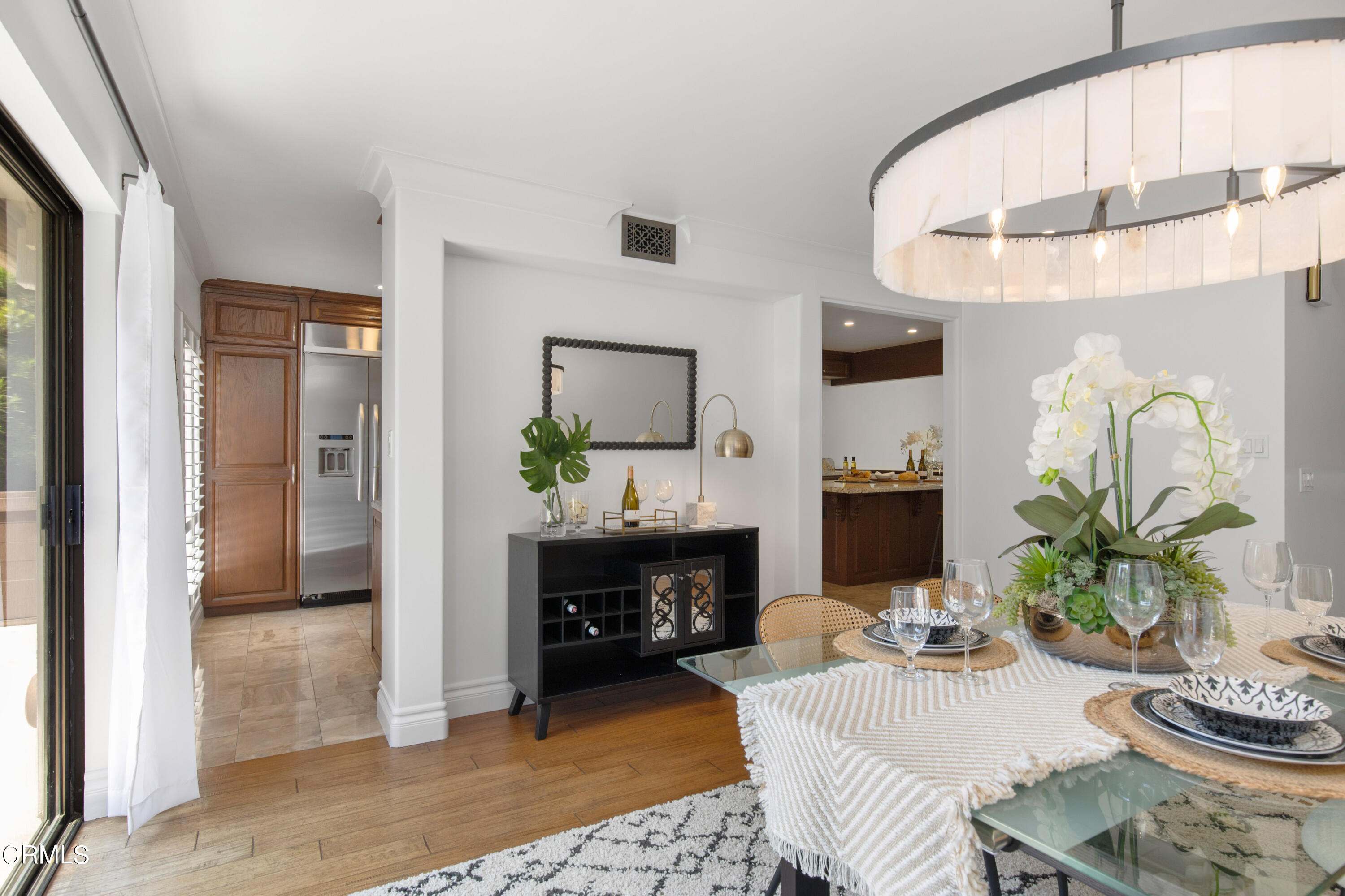 1 South Orange Grove Boulevard, Unit 12 Pasadena, CA 91105 - Photo 8 of 27 a living room with furniture and a fireplace