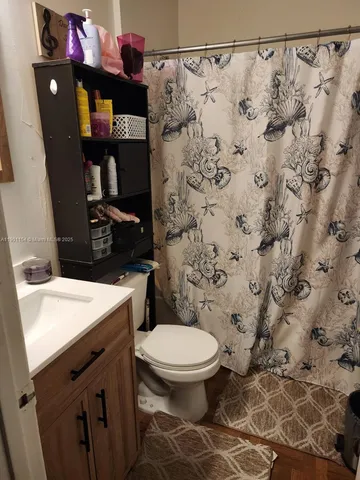 a bathroom with a sink and a toilet