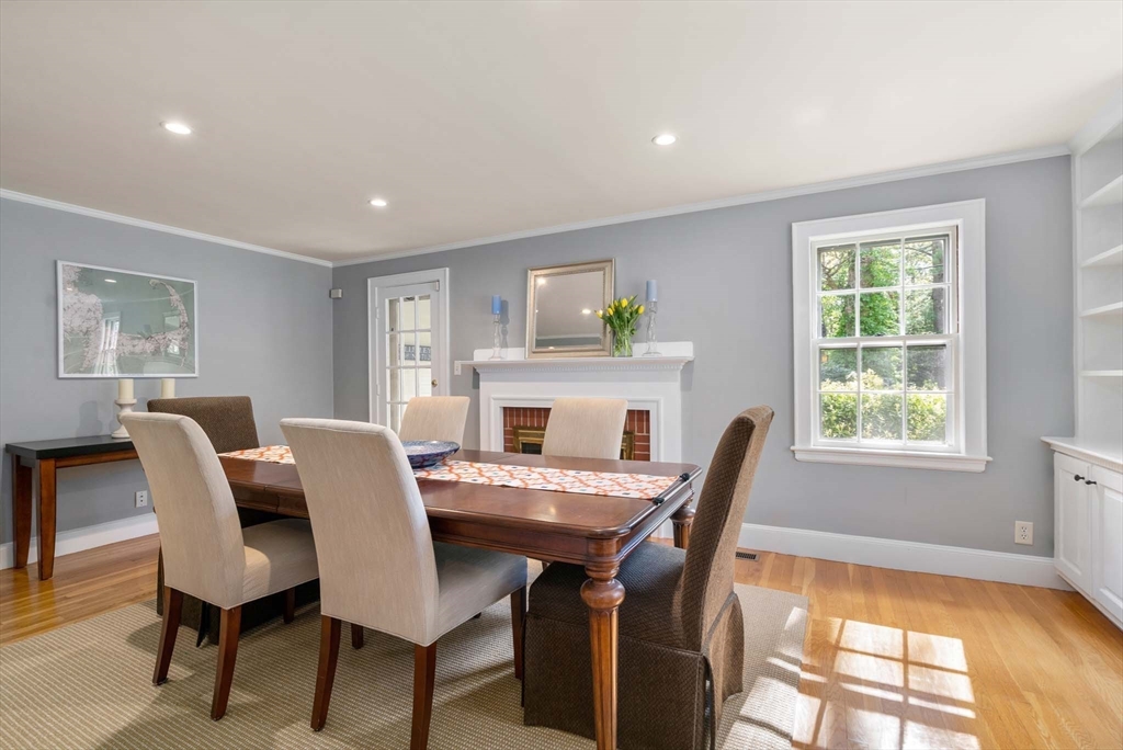 92 Parker Road Wellesley, MA 02482 - Photo 11 of 39 a view of a dining room with furniture window and outside view