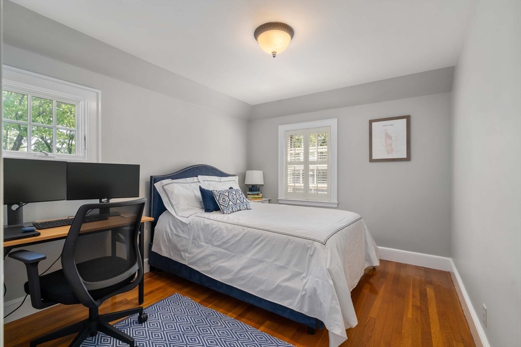 92 Parker Road Wellesley, MA 02482 - Photo 15 of 39 a bedroom with a bed and a window
