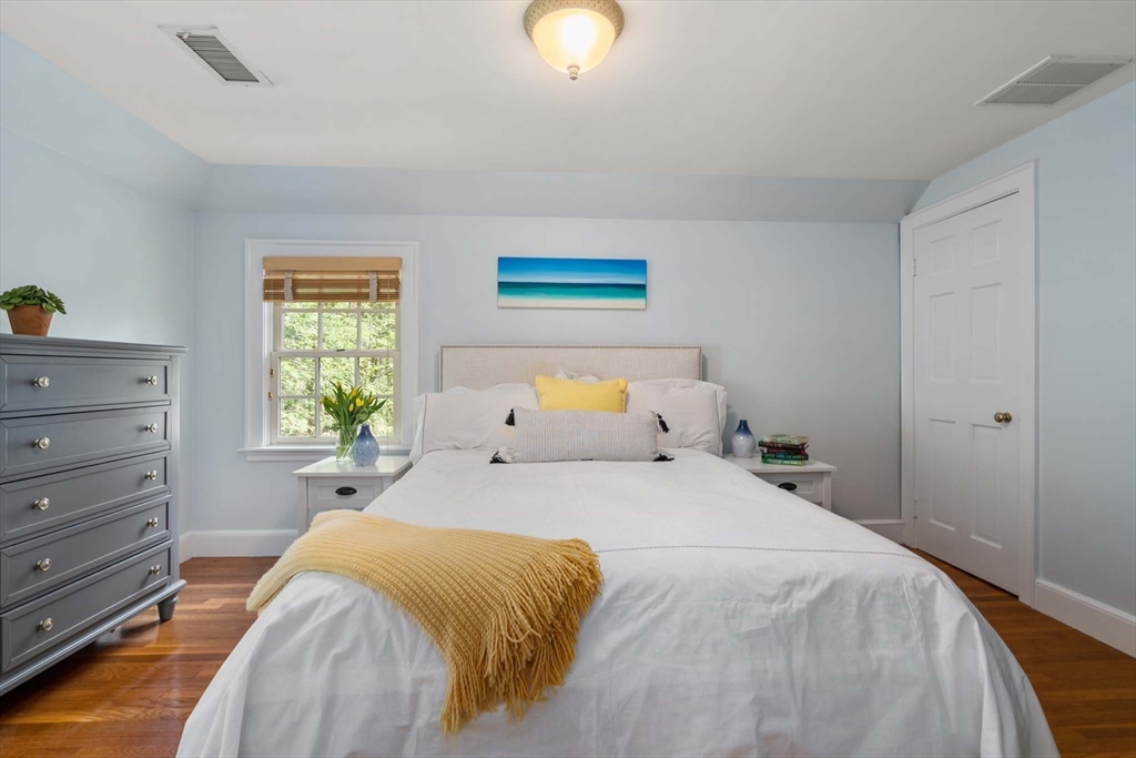 92 Parker Road Wellesley, MA 02482 - Photo 17 of 39 a bedroom with a bed and window