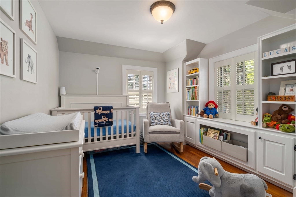 92 Parker Road Wellesley, MA 02482 - Photo 19 of 39 a bedroom with furniture and a window
