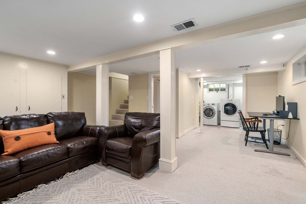 92 Parker Road Wellesley, MA 02482 - Photo 24 of 39 a living room with furniture and a wooden floor