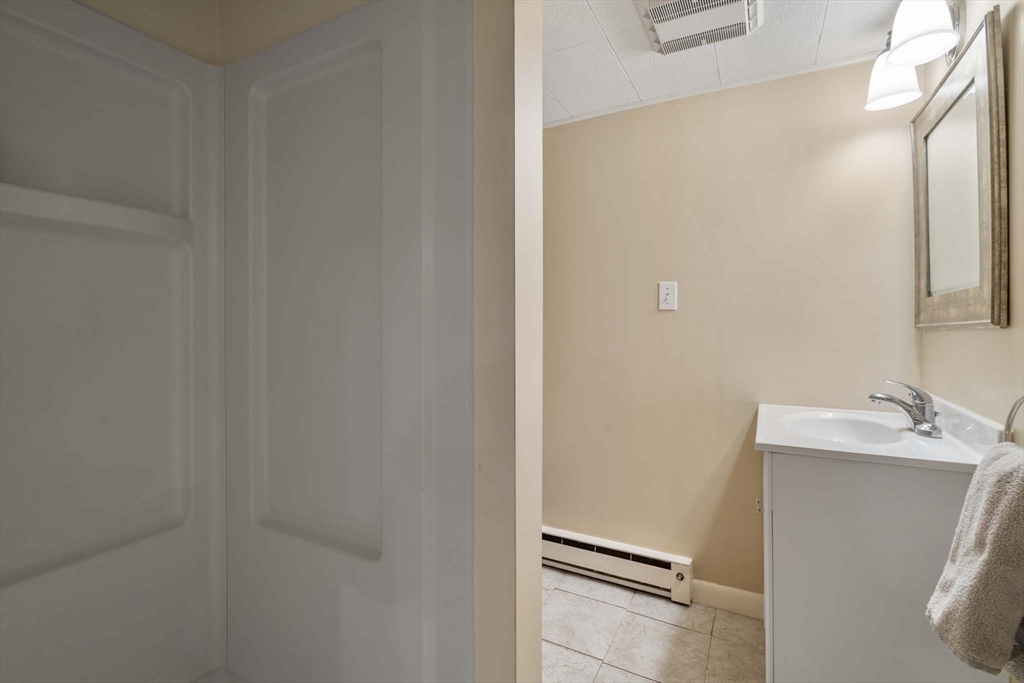 92 Parker Road Wellesley, MA 02482 - Photo 26 of 39 a bathroom with a sink