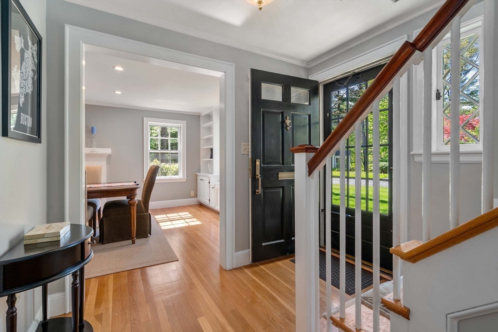 92 Parker Road Wellesley, MA 02482 - Photo 3 of 39 a view of a hallway with furniture and floor to ceiling window