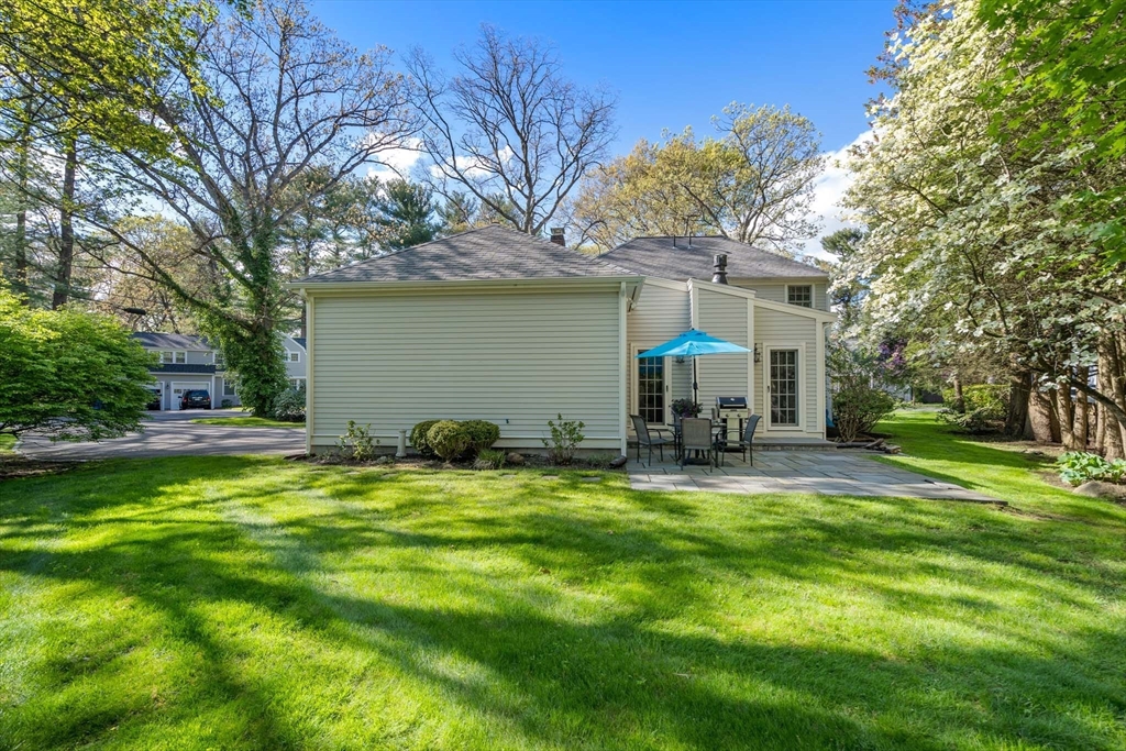 92 Parker Road Wellesley, MA 02482 - Photo 35 of 39 a view of a house with backyard and sitting area