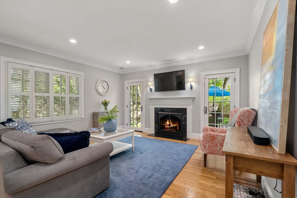 92 Parker Road Wellesley, MA 02482 - Photo 5 of 39 a living room with furniture and a fireplace