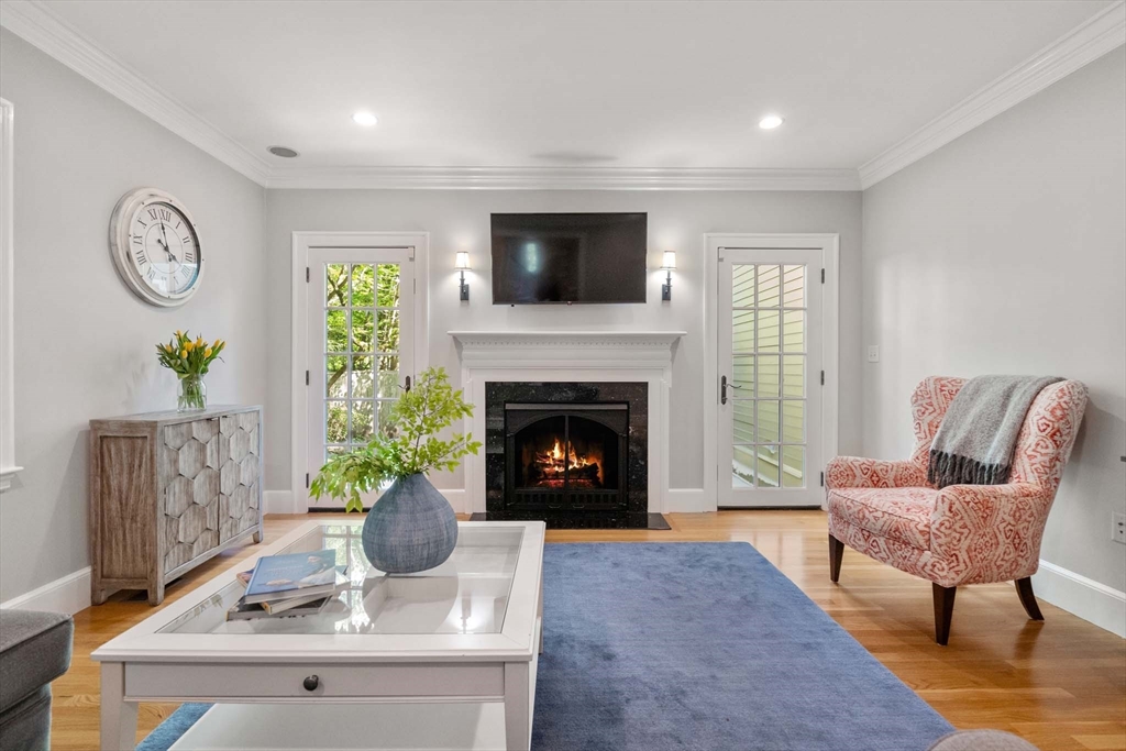 92 Parker Road Wellesley, MA 02482 - Photo 6 of 39 a living room with furniture a window and a fireplace