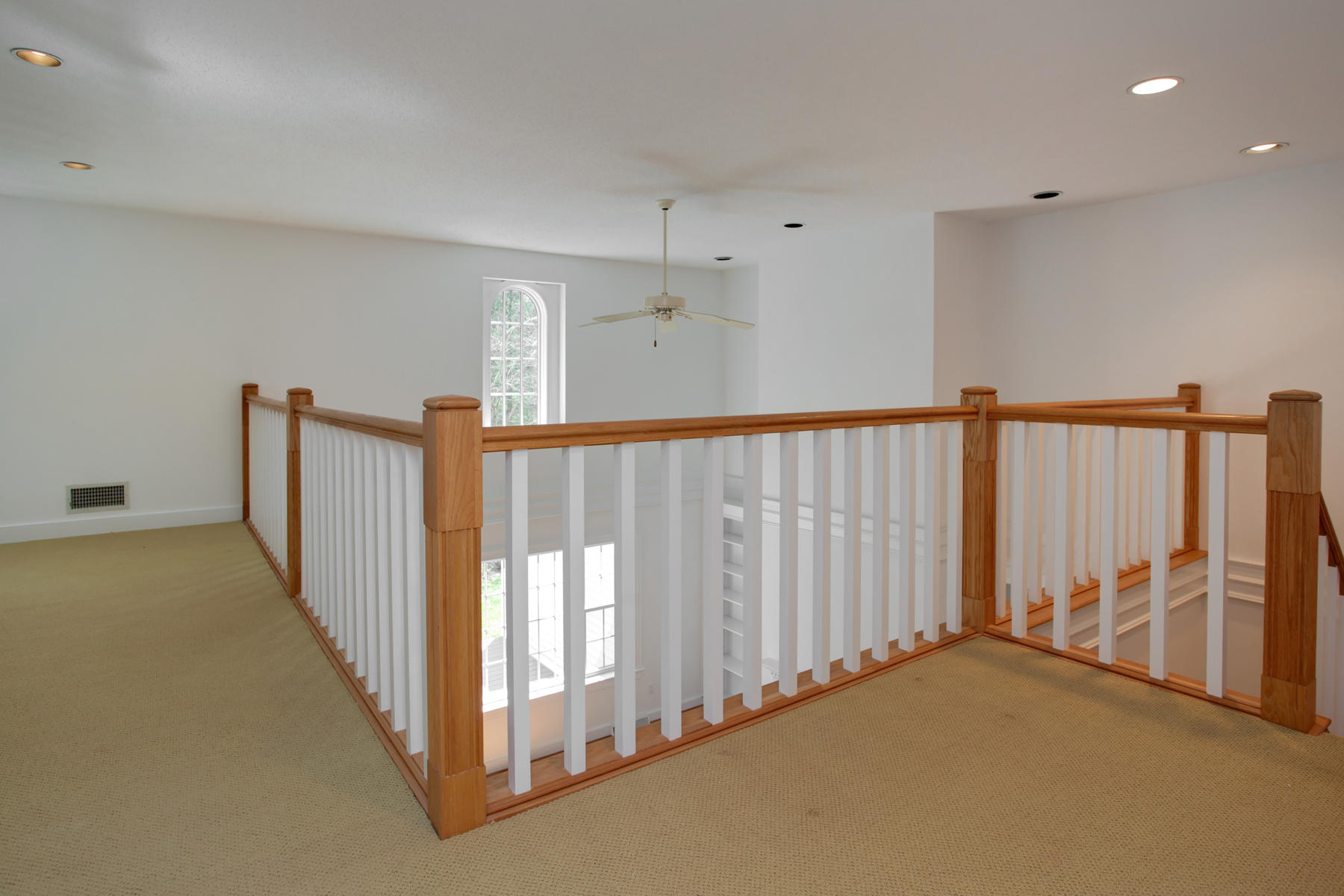 15 Hampton Court, Unit 15 Mashpee, MA 02649 - Photo 19 of 33 a view of a hallway with staircase