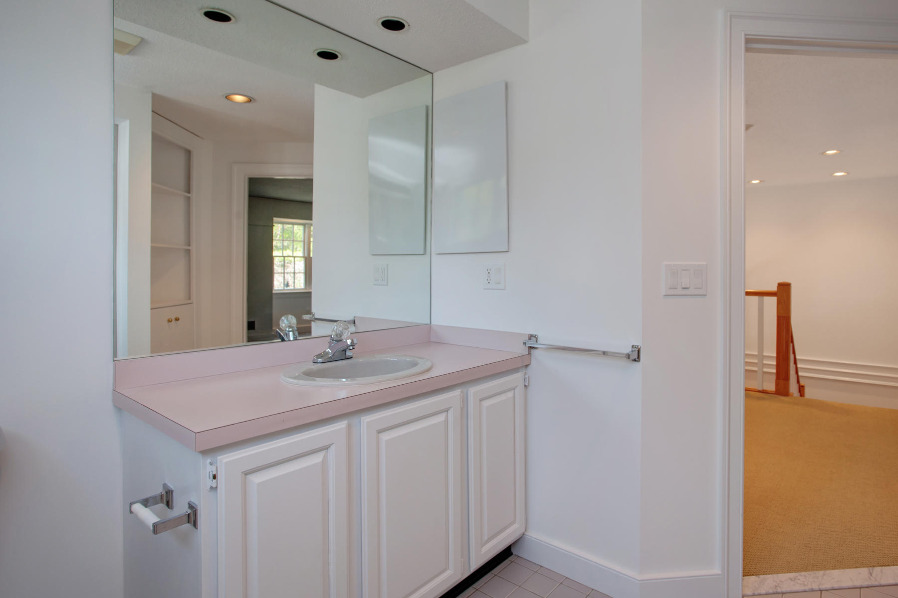 15 Hampton Court, Unit 15 Mashpee, MA 02649 - Photo 24 of 33 a bathroom with a sink vanity and mirror
