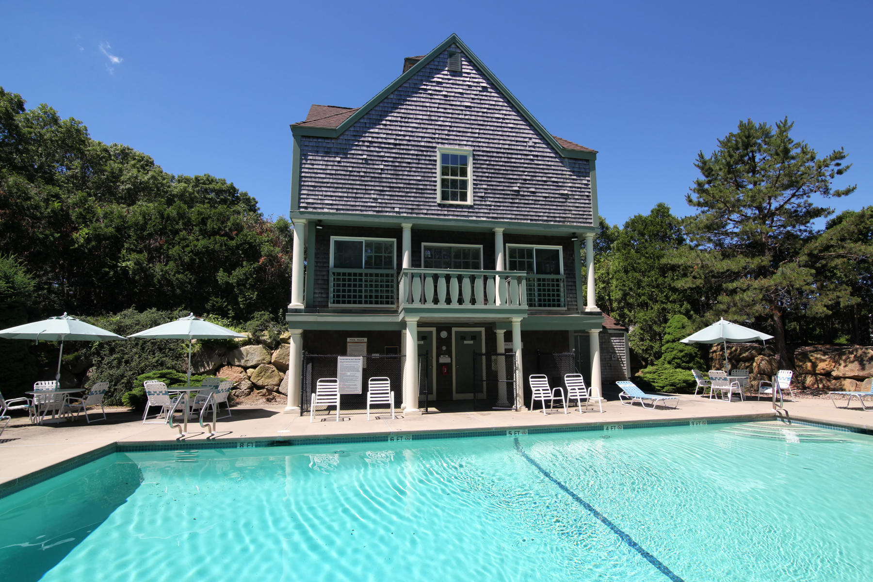 15 Hampton Court, Unit 15 Mashpee, MA 02649 - Photo 32 of 33 a view of house with yard outdoor seating and swimming pool