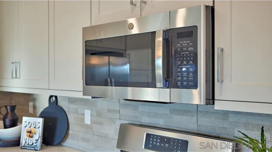 2097 Bluestone Circle, Unit HS110 PLAN 3 Chula Vista, CA 91913 - Photo 4 of 5 a view of cabinets and window