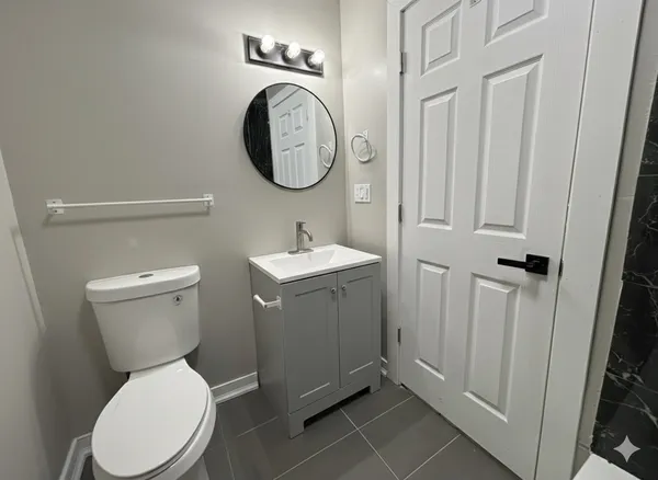 a bathroom with a bathtub and shower