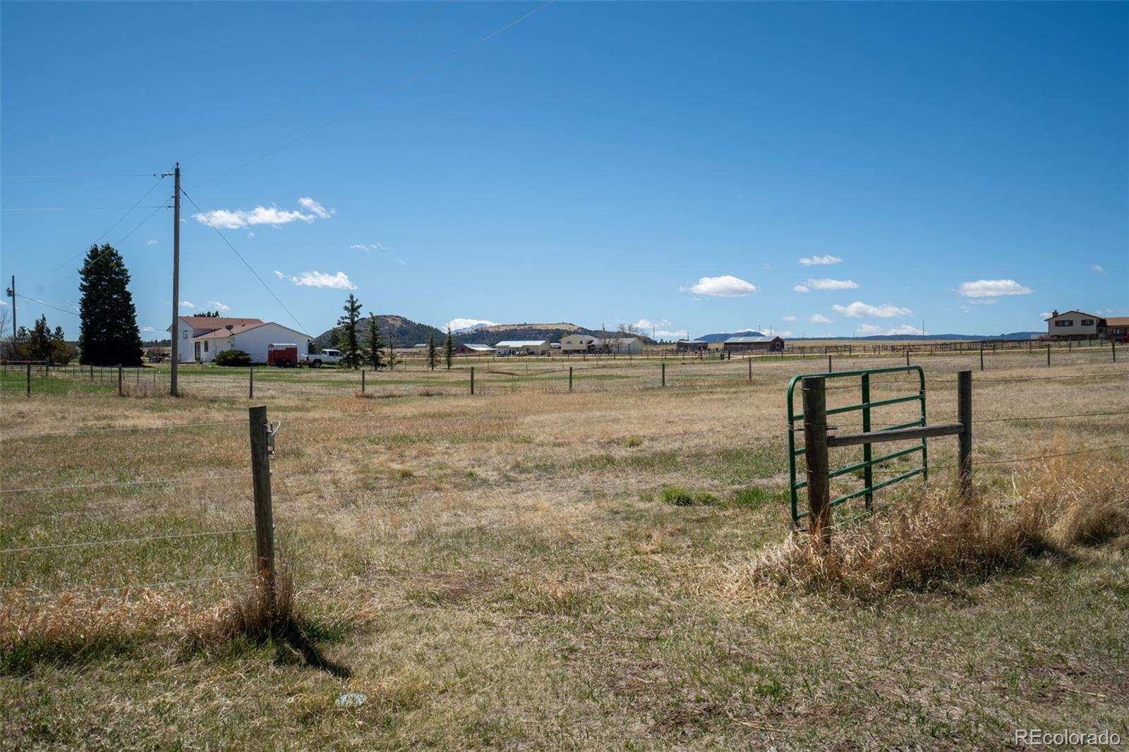 12360 South Mesa View Road Larkspur, CO 80118 - Photo 37 of 50 a view of a water with large trees